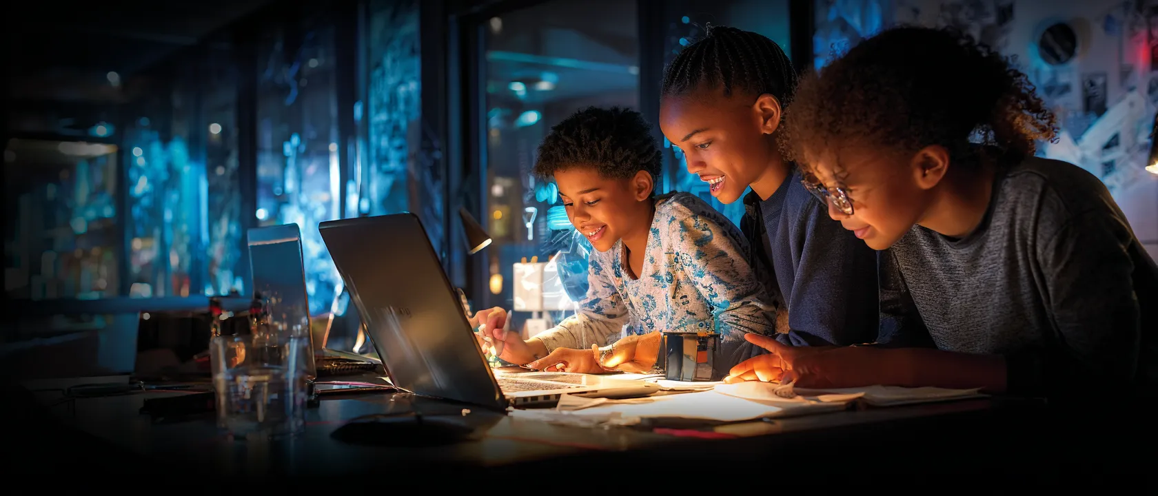 The Williams Preparatory School students learning together at a laptop